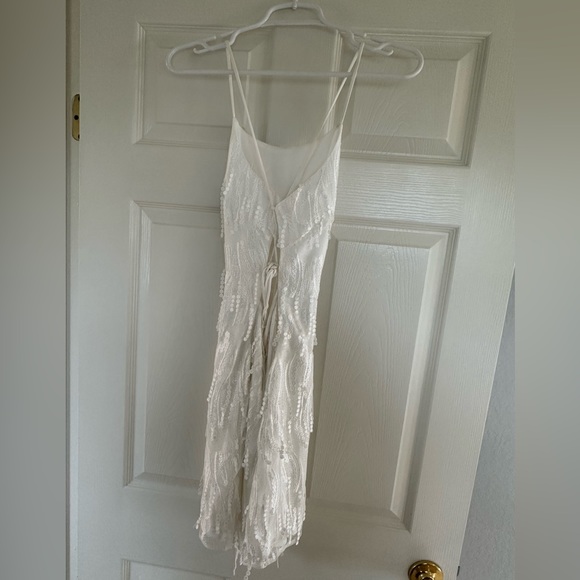 “Making Magic White Fringe Lace-Up Mini” dress from Lulus - Picture 7 of 9